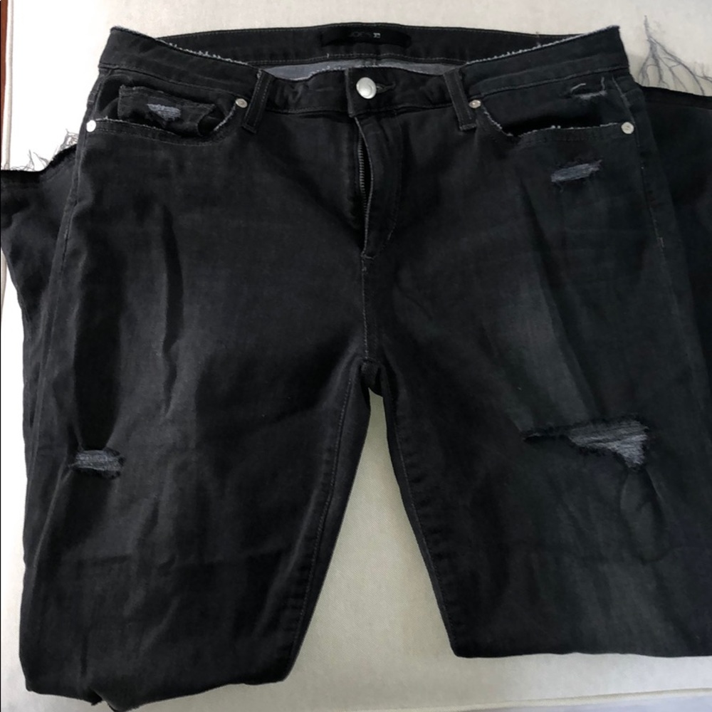 Black distressed, raw hem Joe’s Jeans